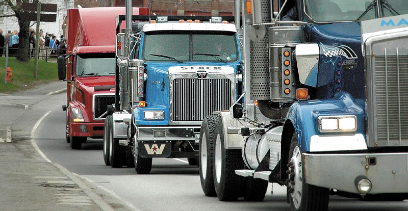 MEMORIAL: More than 20 truckers joined a procession in Skowhegan on Thursday to honor longtime truck driver Maxell "Mackie" Moore, who died April 27. His truck is first in line.