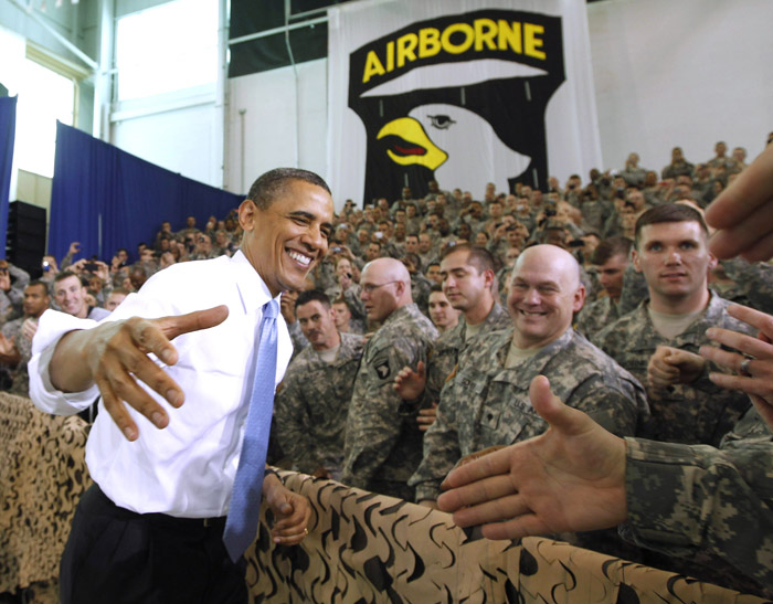 President Barack Obama greets military personnel at Fort Campbell, Ky., today.