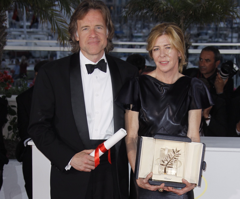 Producers Bill Pohlad, left, and Dede Gardner hold the Palme d'Or for the film "The Tree of Life" during the awards photo call at the 64th international film festival, in Cannes, southern France, today. "The Tree of Life", which opens in the U.S. on Friday, was selected as the top picture.
