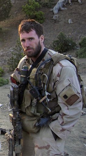This undated file photo released by the U.S. Navy shows Navy Seal Lt. Michael P. Murphy, from Patchogue, N.Y. Murphy who was killed while leading a reconnaissance mission deep behind enemy lines in Afghanistan received the nation's highest military award for valor _ the Medal of Honor, A warship bearing the name of the Medal of Honor winner will be christened on what would have been his 35th birthday Saturday, May 7, 2011 at Bath Iron Works, where the 9,500-ton destroyer is being built. (AP Photo/U.S. Navy, File) BUDS LT Lieuenant kia medal of honor MOH