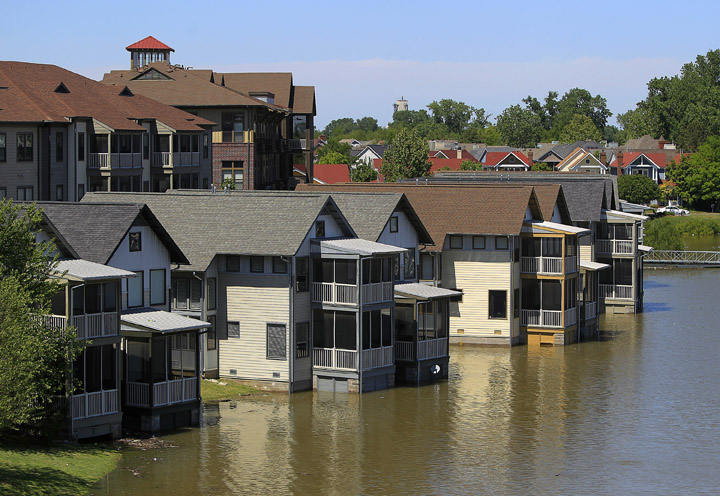 Homes on Mud Island that are usually high above the water level are met by the rising waters of the Mississippi River in Memphis, Tenn. The National Weather Service is predicting a 48-foot crest of the Mississippi River on May 11.