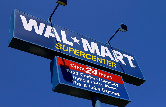 Walmart says its low-income customers are having a harder time stretching their dollars to the next payday than last year.