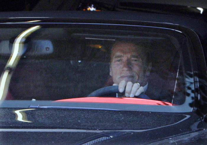 Former California Governor Arnold Schwarzenegger leaves his office Tuesday in Santa Monica, Calif.