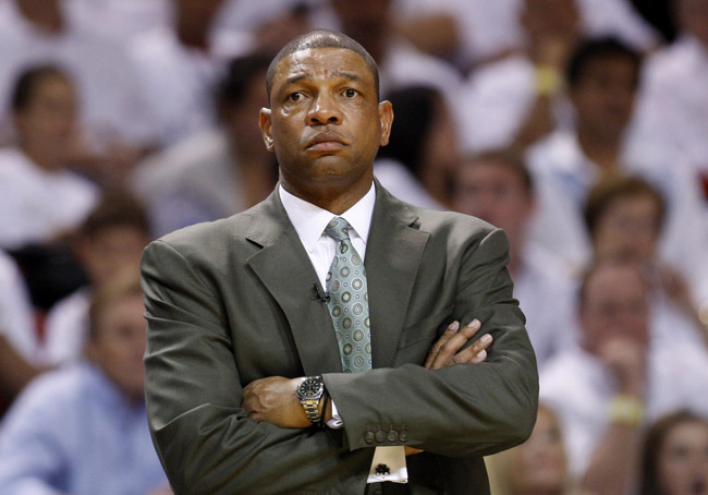 Boston Celtics' coach Doc Rivers watches the final minutes of playoff Game 5 against the Miami Heat on Wednesday. The Heat won 97-87 to advance to the Eastern Conference finals.