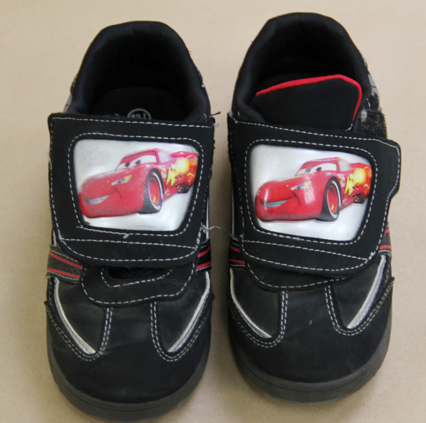 Maine State Police released this photo of the "Lightning McQueen" sneakers worn by the boy when his body was found on Saturday. The sneakers appear to have been recently purchased.