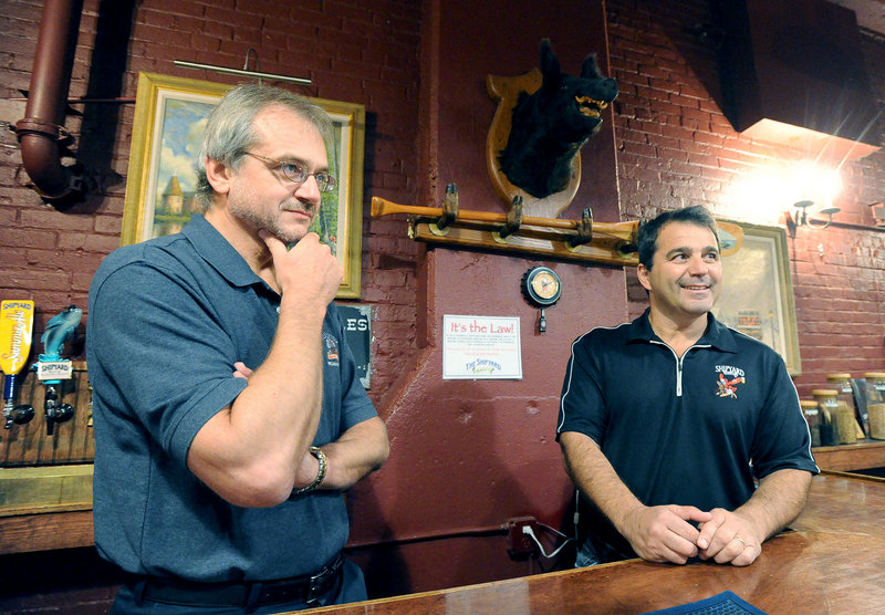 Shipyard co-owners Alan Pugsley, left, and Fred Forsley, seen in the tasting room, have created one of the top craft breweries in America.
