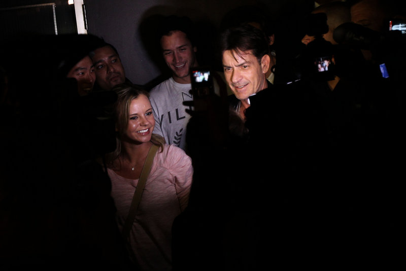 Charlie Sheen arrives at Chicago’s Enclave nightclub April 3 after appearing at the Chicago Theater in the stage show he created when CBS fired him March 7.