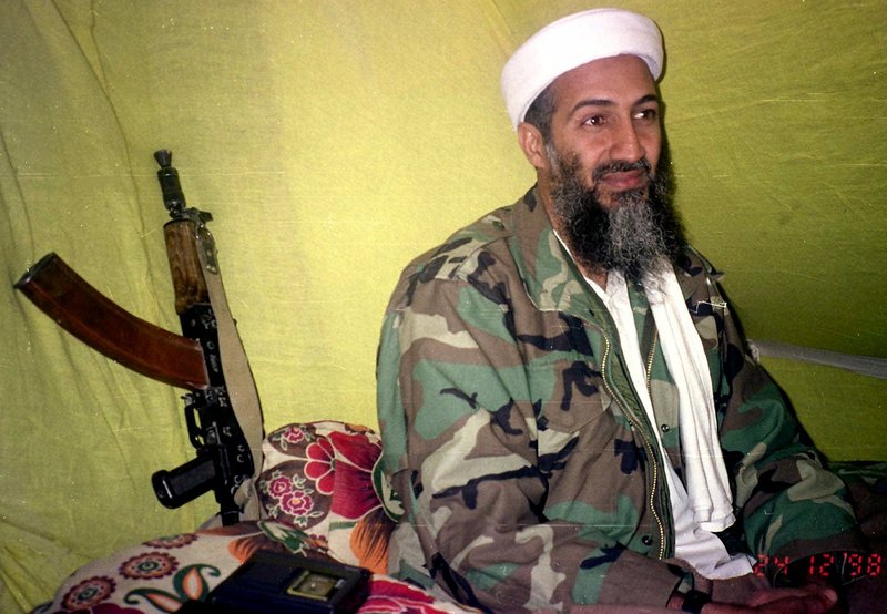 Al-Qaida leader Osama bin Laden speaks to a group of reporters in southern Afghanistan in 1998. Bin Laden surrounded himself with a private army and declared a holy war against the United States.