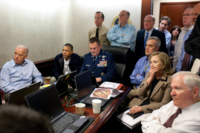 President Obama and Vice President Joe Biden, along with members of the national security team, track the mission against Osama bin Laden from the Situation Room of the White House on Sunday in this image released by the White House and digitally altered by the source to diffuse the paper in front of Secretary of State Hillary Rodham Clinton.