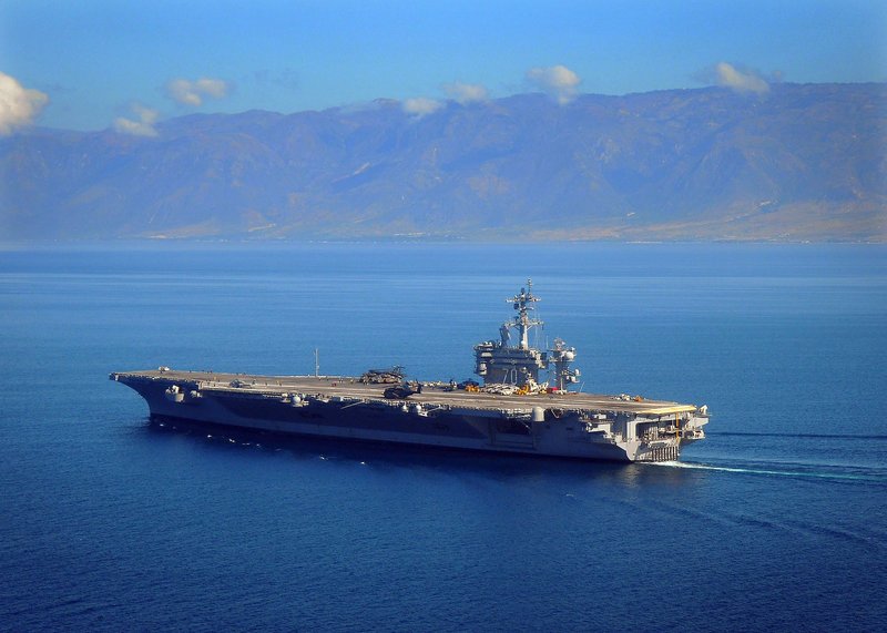 The aircraft carrier USS Carl Vinson maneuvers off the coast of Haiti in 2013.
