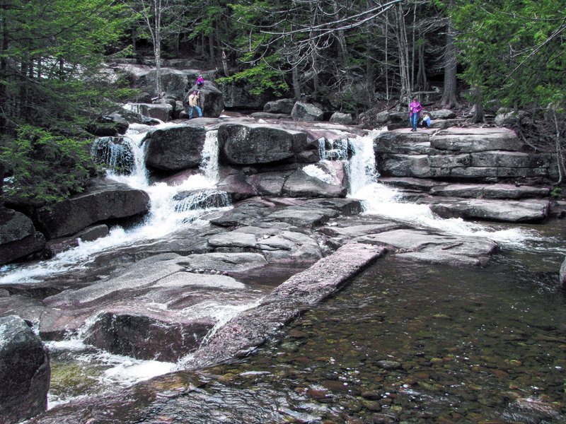 White Mountain National Forest’s Moat Mountain Trail leads to Diana’s Baths, a series of cascading waterfalls and pools.