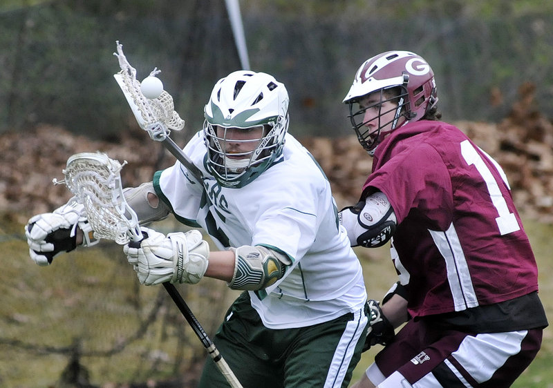 Erik Rost of Greely, right, and Luke Wendland of Waynflete seek to gain control of the ball. Waynflete improved its record to 3-1. Greely is 1-2.