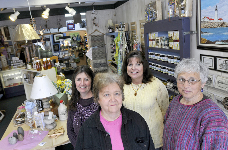 At Stone Soup Artisans, from left, Deb Georgitis, Joanne Kenyon, Carol Funk and Sue Littlefield are among the dozen artists who staff the cooperative retail outlet. “We couldn’t do this if we had to pay salaries,” Kenyon said.