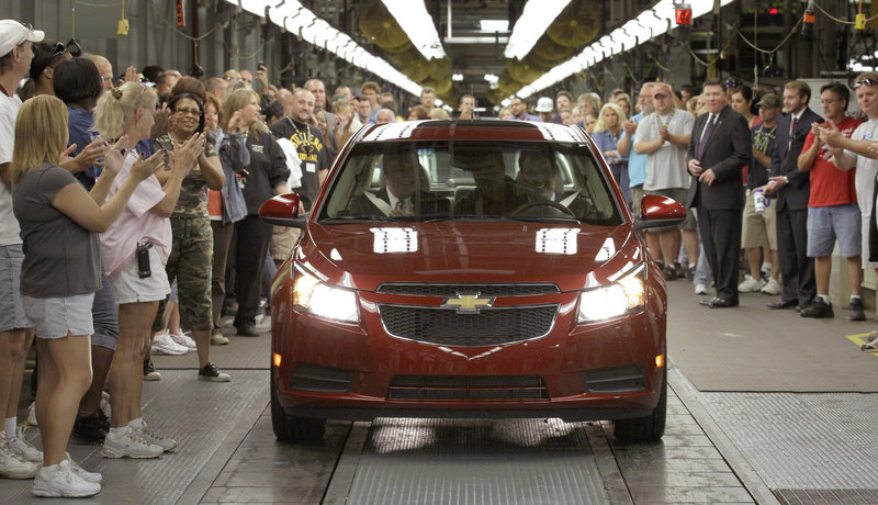 Workers cheer as the first Chevrolet Cruze compact sedan rolls off the assembly line last September at the GM factory in Lordstown, Ohio. Chevrolet sold 150,652 Cruzes in the first quarter of 2011, a 117 percent increase over a year ago.