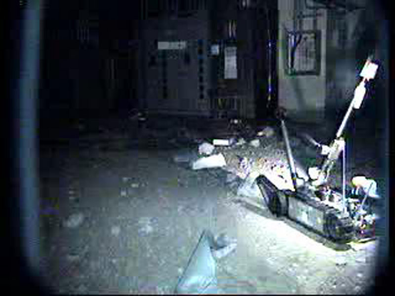 Tokyo Electric Power Co. released this file photo of a radio-controlled robot as it advances inside the reactor building of Unit 1 at the Fukushima Dai-ichi Nuclear Power Plant in Okuma. Japan’s nuclear safety agency said workers entered the reactor building of Unit 1 Thursday for the first time since the March 11 earthquake.