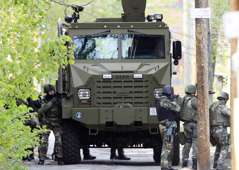 With the SWAT team ready, officials say they have made contact with the armed man holed up in Manchester, N.H.