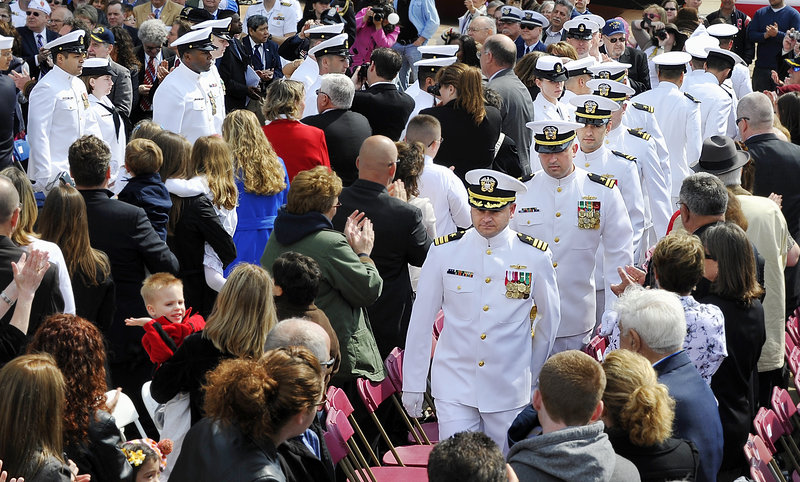 The ship’s crew arrives at the ceremony to a standing ovation. The ship, which his family considers a floating monument to Lt. Michael Murphy and the others who died that day, is expected to be in its home port of Pearl Harbor by June 2012.