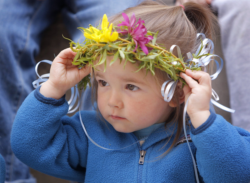 Willow West, 2, of Kennebunkport holds onto her crown while attending a fairy program at the Kennebunk Free Library.