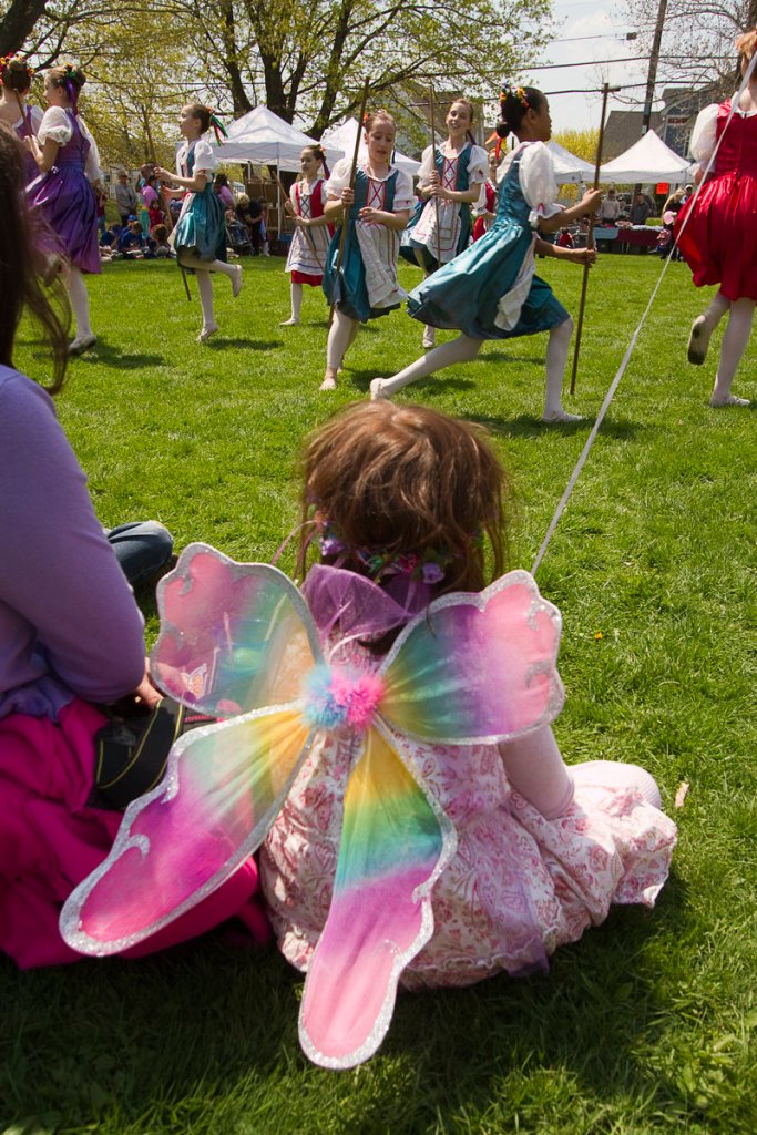 A young dance spectator rests her wings.