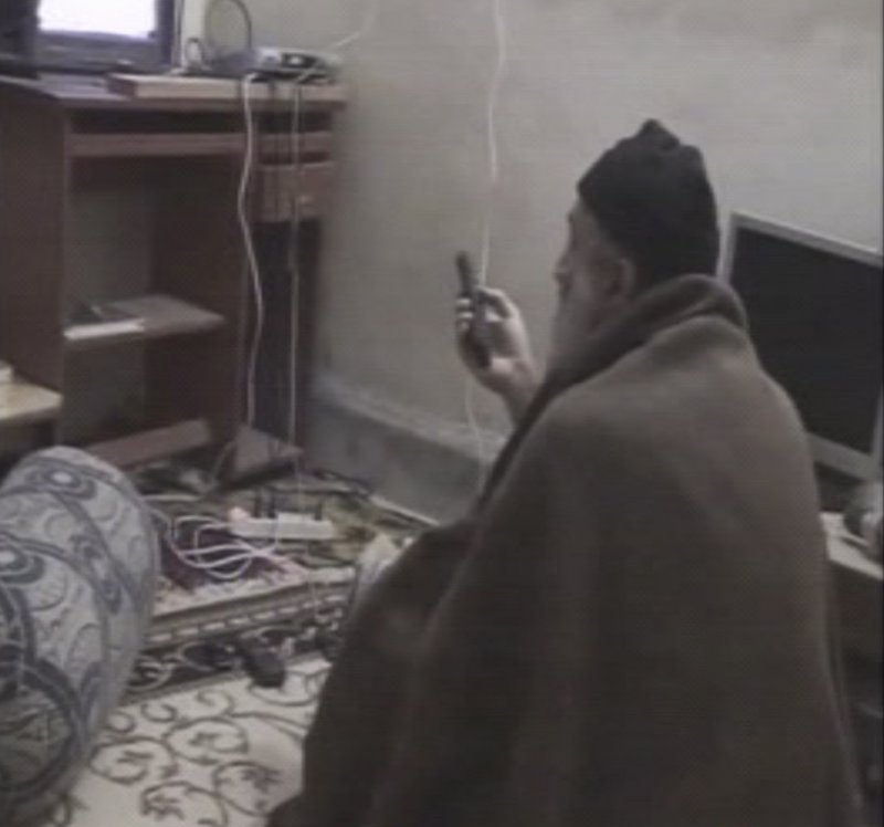 A man the U.S. government says is Osama bin Laden watches TV in this image from video released Saturday.