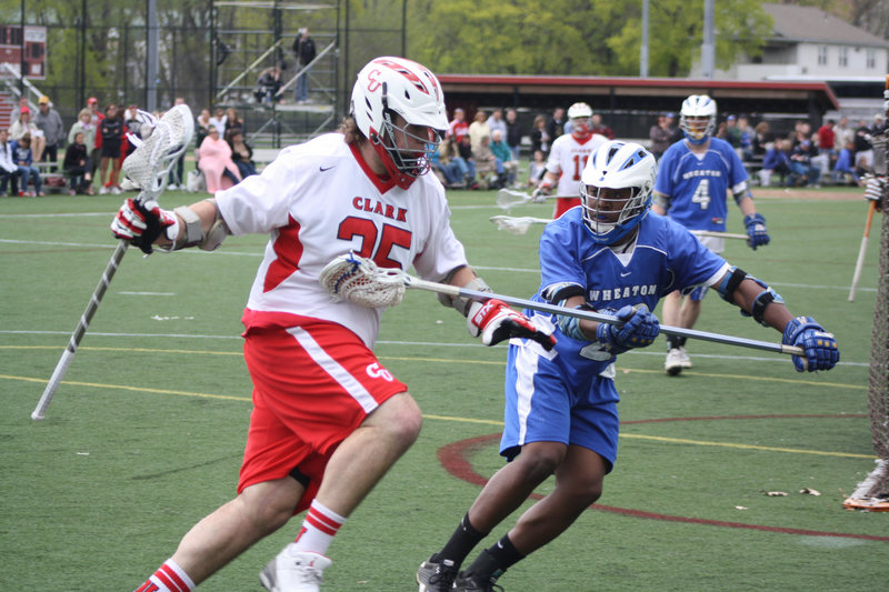 Eugene Arsenault, left, of South Portland played football in high school but used his tackle-like size of 6-foot-6 and 275 pounds along with uncommon agility to become an outstanding lacrosse player at Clark University.