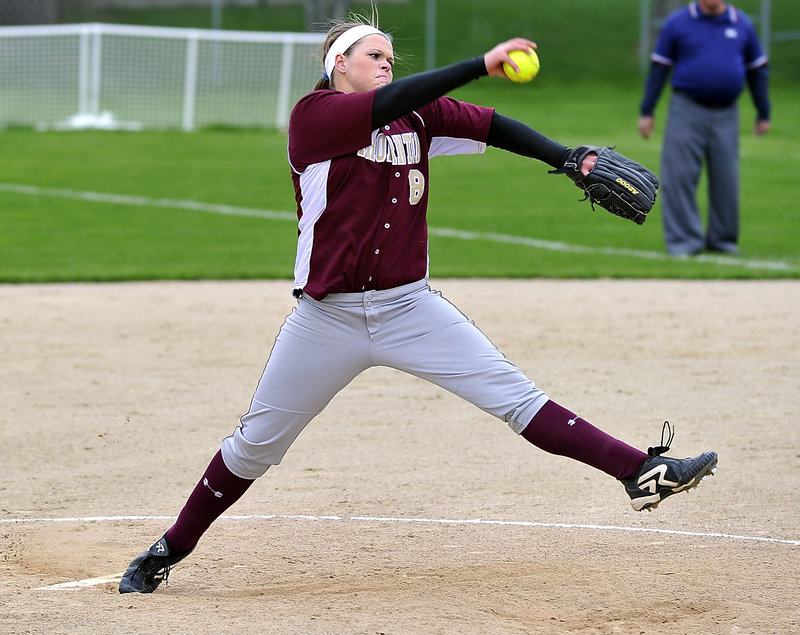 Julia Geaumont of Thornton Academy pitches out of a bases-loaded jam in the seventh inning against Biddeford on Monday afternoon. Geaumont gave up just two hits and struck out seven as the Trojans beat the Tigers 1-0 in nine innings.