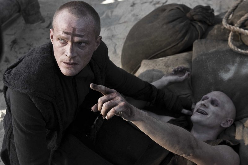 Priest (Paul Bettany) finishes off Familiar #1 (Josh Wingate) in the new sci-fi action thriller "Priest."