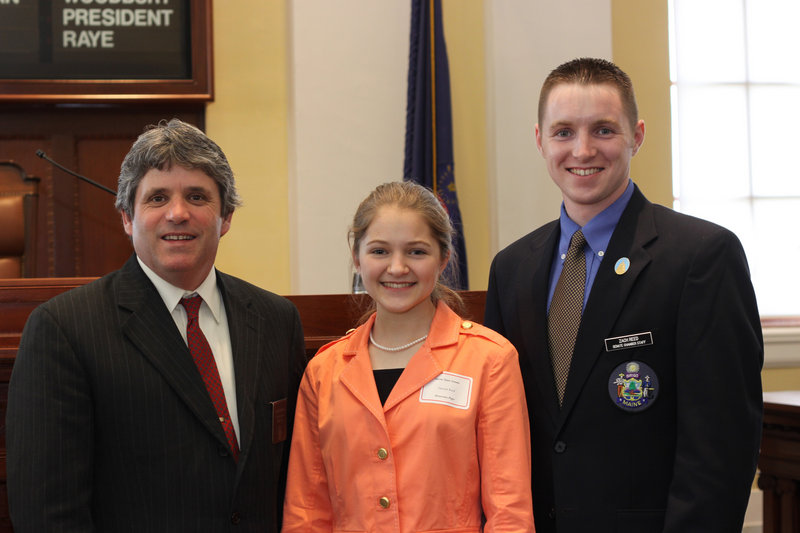 Hannah Reed, a 15-year-old home-schooled student from Nobleboro, recently served as an honorary page in the Maine Senate. She is seen in the well of the Senate with state Sen. David Trahan, R-Waldoboro, left, and her brother Zachary Reed, right, who is a member of the Maine Senate Chamber staff.