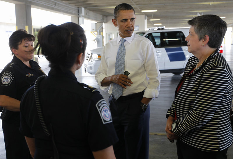 President Obama and Homeland Security Secretary Janet Napolitano tour a cargo facility in El Paso, Texas, on Tuesday, during their visit to the U.S.-Mexico border.