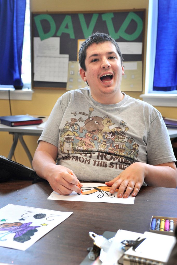 David Bouchard greets visitors to his classroom at the Morrison Center. In 2007, an autistic high school graduate in Maine could easily transition into publicly funded adult services, but today, waiting lists are long.