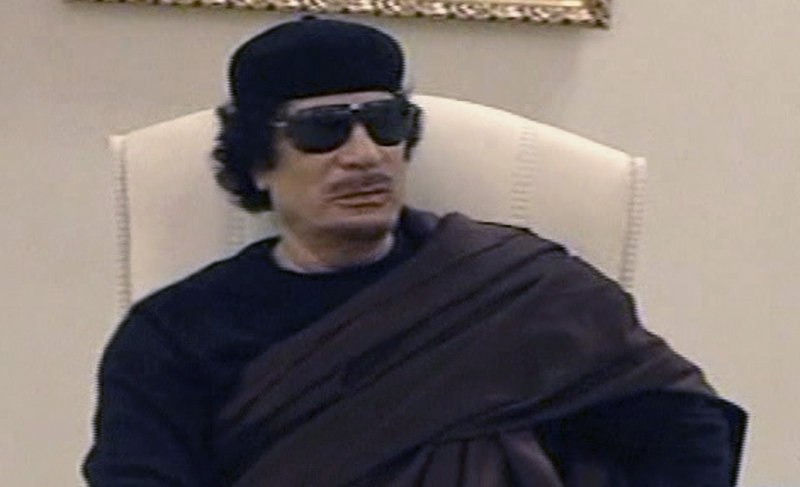 Libyan leader Moammar Gadhafi met in a Tripoli hotel Wednesday with tribal leaders from eastern Libya. The televised meeting marked his first public appearance since April 30 when NATO airstrikes hit his complex.