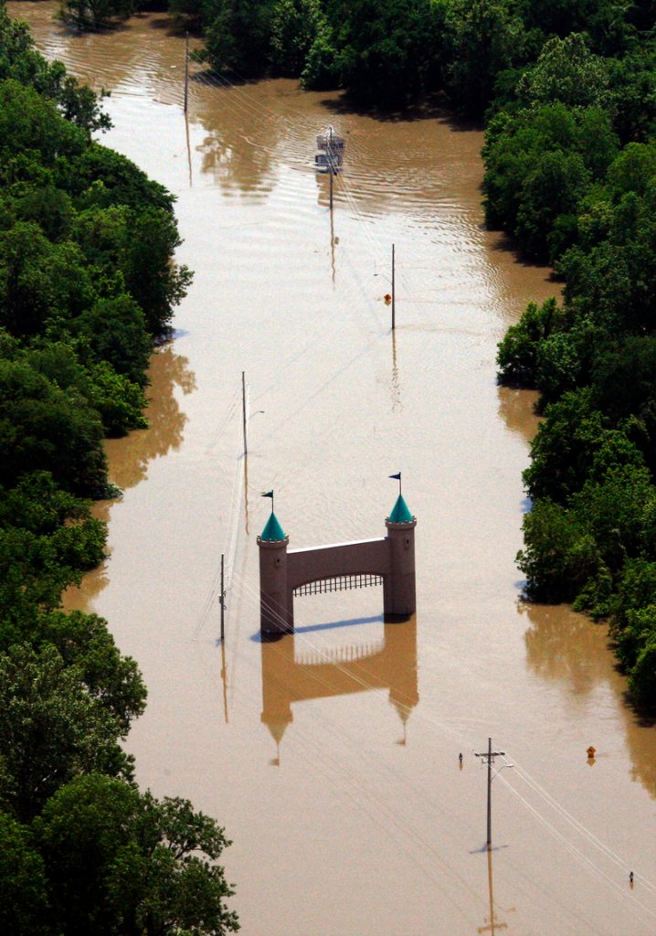 Mississippi River floodwaters surround the entrance gate to Fitzgeralds Tunica, a casino and hotel in Robinsonville, Miss., on Wednesday. The Mississippi has flooded 3 million acres in Arkansas, Tennessee and Mississippi.