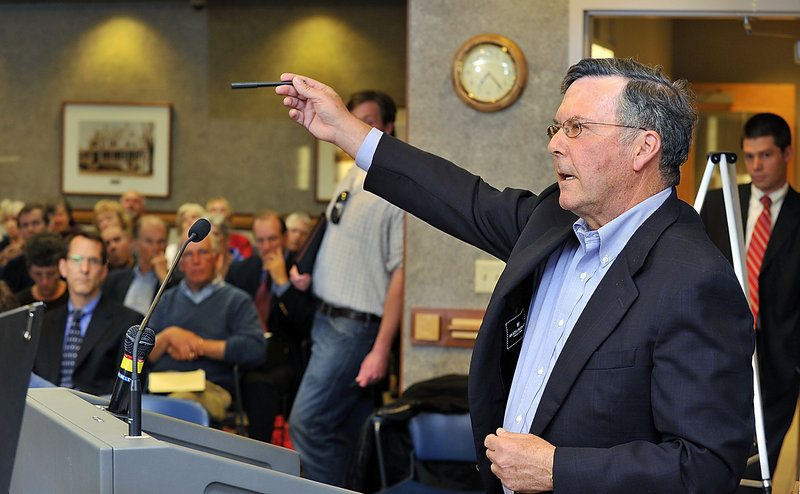 Peter Rubin, who lives near the site of the proposed oceanfront recreational facility in Scarborough, describes his opposition to the Sprague Corp. plan at a meeting of the town’s Zoning Board of Appeals on Wednesday.