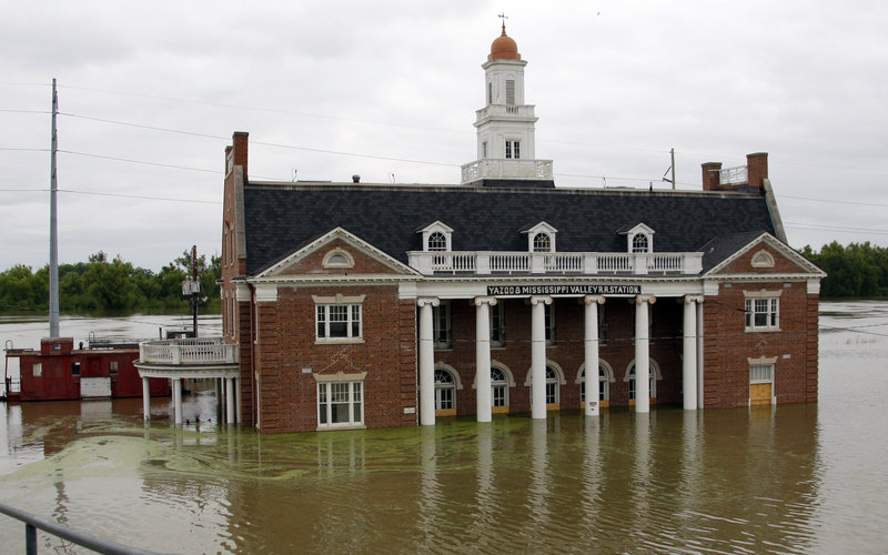 Mississippi River floodwaters creep up the Old Train Depot in downtown Vicksburg, Miss., on Saturday.