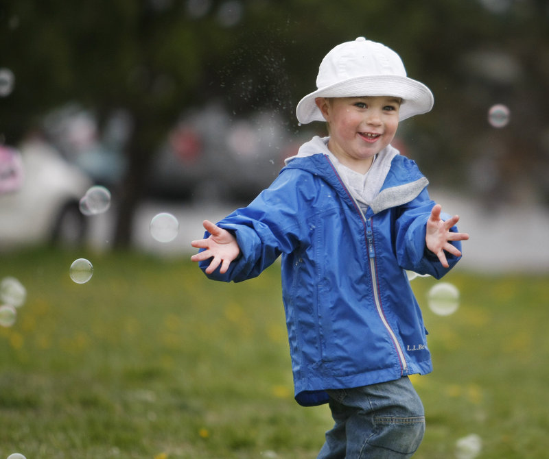 Paul Sames, 4, of South Portland has some fun chasing bubbles.