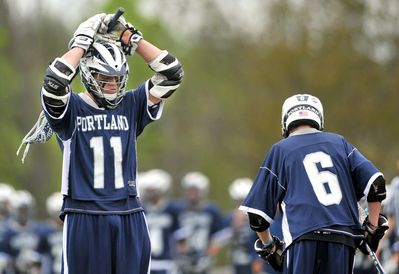 Caleb Kenney of Portland reacts Saturday after Messalonskee, which had trailed 4-0, took the lead in the third quarter en route to an 8-5 victory in lacrosse.