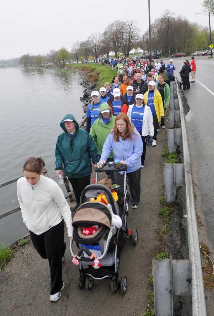 A light rain doesn't deter participants in the Southern Maine Heart Walk. About 4,000 Mainers died of heart disease in 2010.