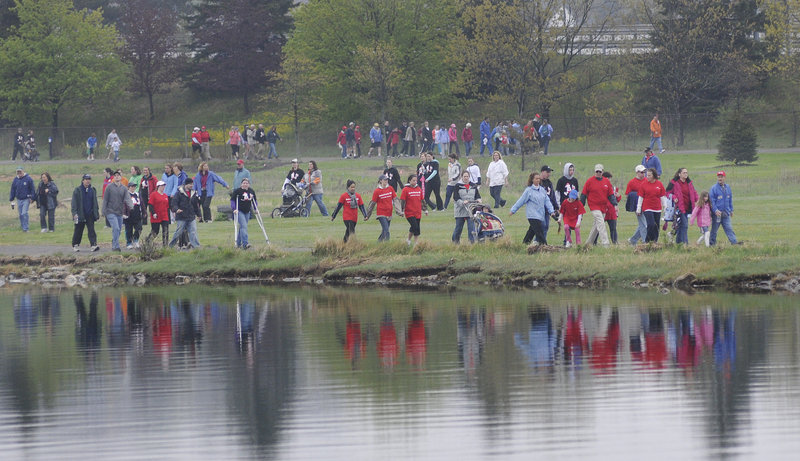 Participants in the 2011 Southern Maine Heart Walk go around Back Cove in Portland on Sunday. Depending on their condition, those taking part could walk one or four miles. Most of the funds raised will go toward research grants, said an American Heart Association spokeswoman.