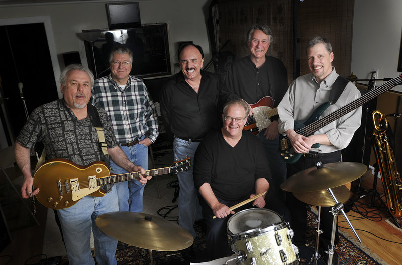 The All-Stars, from left, Mickey Gouzie, Brad Harnois, Rob Rocheleau, Steve Wark (seated), Tom Dyhrberg and Mike Wormwood, will play rock hits from their youth Saturday.