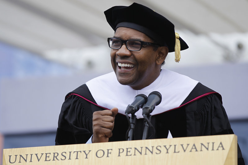 Actor Denzel Washington speaks at commencement at the University of Pennsylvania. He talked about his struggles in college and said he came close to flunking out before switching to drama and getting his degree.