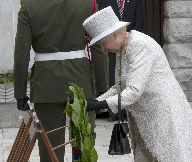 Britain’s Queen Elizabeth II lays a wreath in the Garden of Remembrance in Dublin on Tuesday. The garden is dedicated to the memory of those who died in the struggle for Ireland’s freedom from often harsh and repressive British rule. Northern Ireland remains part of the United Kingdom.