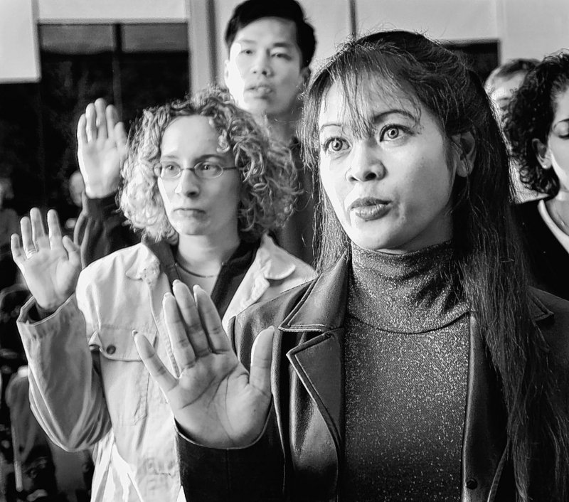 Asian immigrants like Chhouk Chhay of Portland, who took the oath of citizenship in 2003, are contributing to Maine.
