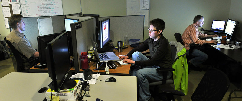 Computer engineers in CashStar Inc.’s engineering and design department work on new applications for the Portland firm, which manages digital gift card programs for a number of major retailers, including Home Depot.