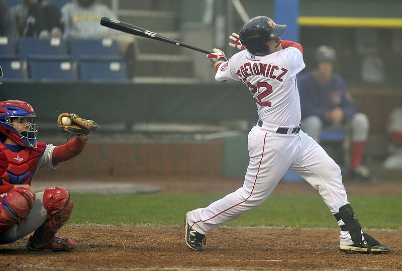 Tim Federowicz takes a cut at a pitch during the Sea Dogs’ game against the Phillies. Federowicz had an RBI single that helped Portland take a 4-2 lead.