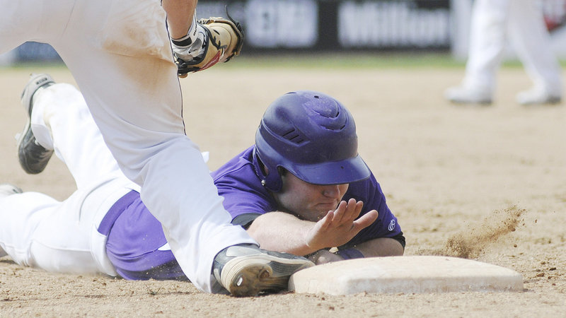 Devon Fitzgerald of Deering is picked off first base immediately after breaking up Scott Heath's no-hit bid with a single up the middle as a pinch hitter in the sixth inning.