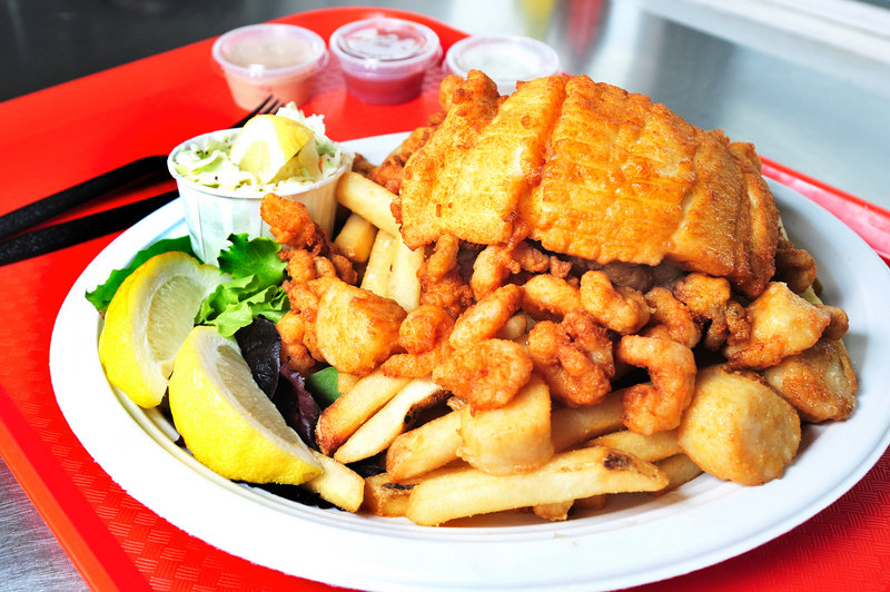 Portland Lobster Co.’s Fisherman’s Platter consists of haddock, scallops, clams, french fries and coleslaw. Fried dinners run $10 and up.