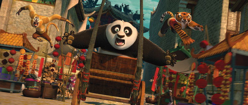 Po, center, voiced by Jack Black, Monkey, left, voiced by Jackie Chan, and Tigress, voiced by Angelina Jolie, are shown in a scene from "Kung Fu Panda 2."