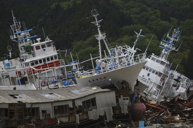 More than two months after an earthquake and tsunami devastated areas of northeastern Japan, fishing boats were still sitting on shore Tuesday in Kesennuma, Miyagi prefecture. The disaster left more than 24,000 people dead and damaged farms and ports.
