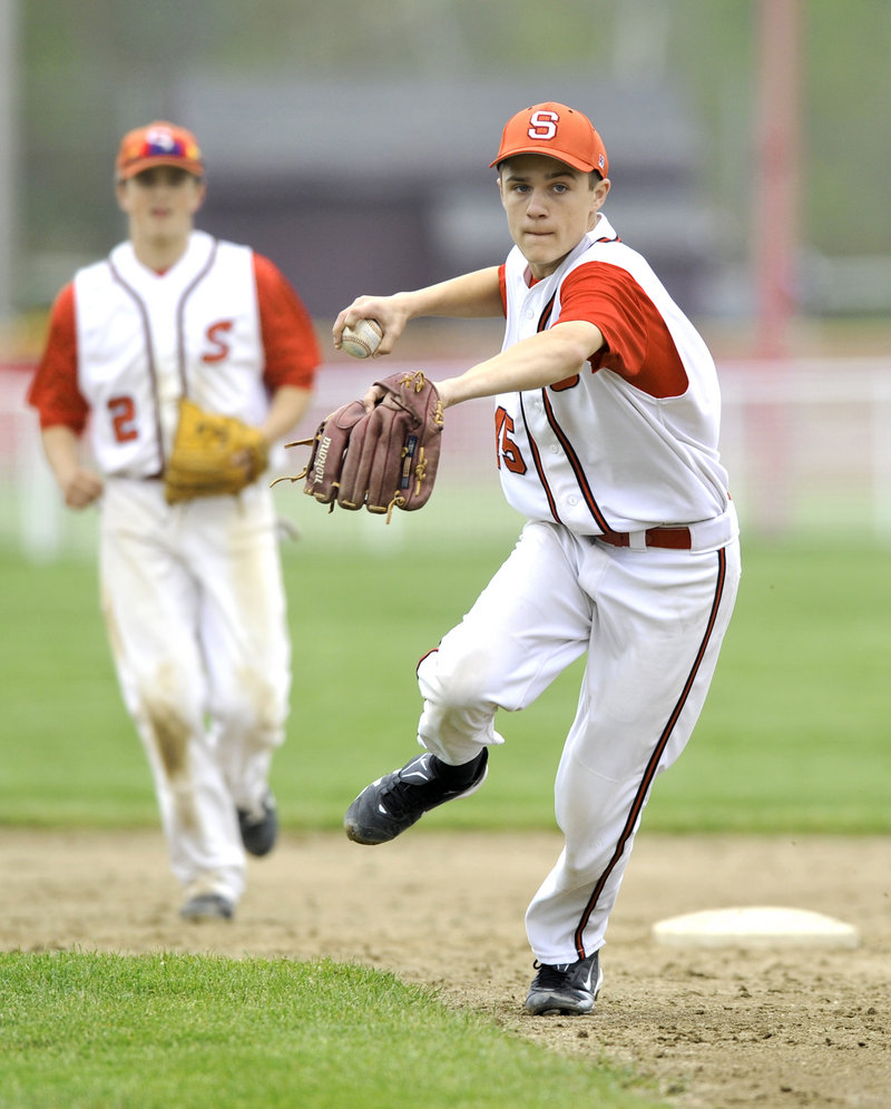 Nick Bagley, a second baseman who had both of Scarborough's hits in a 4-3 loss at home to Deering, readies to throw to first base Thursday after coming up with a slow roller.