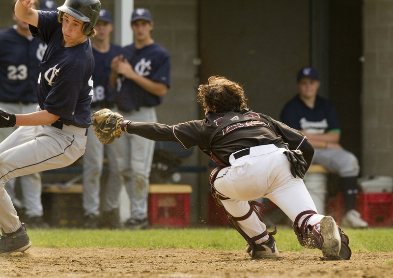 Joey King of Yarmouth avoids a tag attempt by Greely catcher Pete Stauber to score Friday in the fourth inning. King scored on a two-run single by Ryan Cody – part of a comeback from a 5-0 deficit that gave the Clippers a 6-5 victory in a Western Maine Conference game at home.